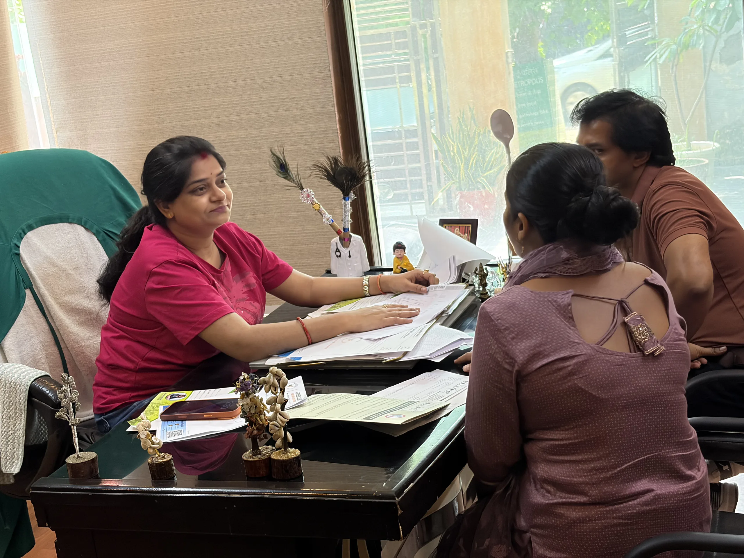 Dr. Neha Mahajan discussing patient health concerns during Ayurveda consultation
